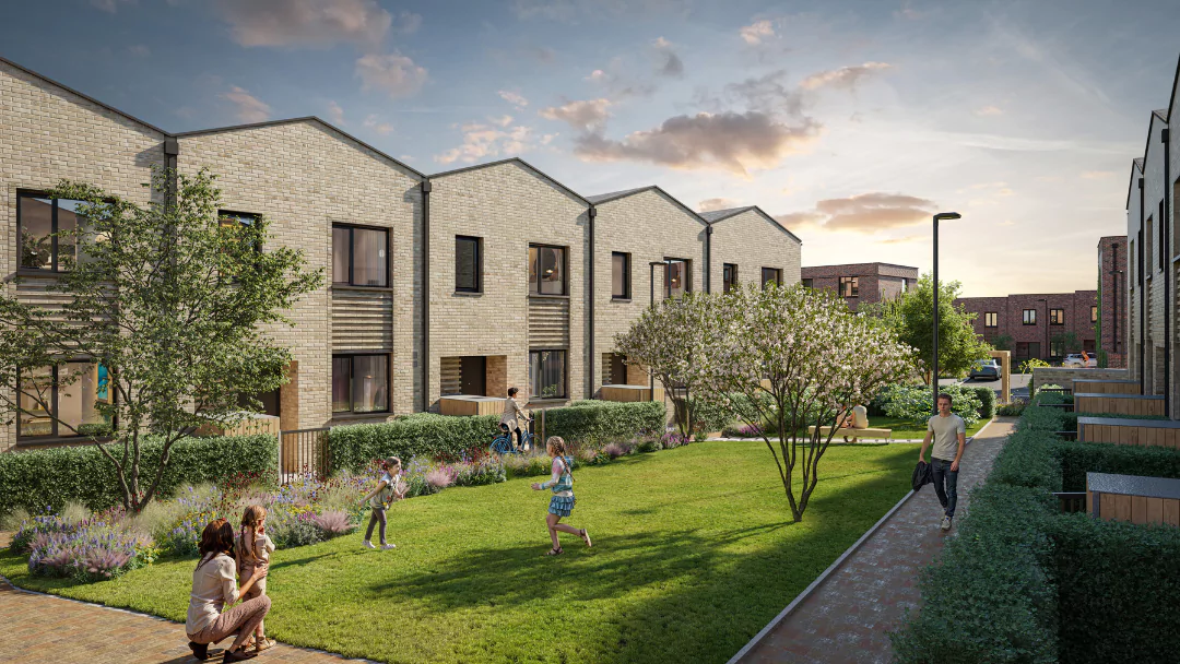 Residents garden at The Heritage District, with townhouses surrounding the garden and two children running and playing on the grass, and a parent supervising.