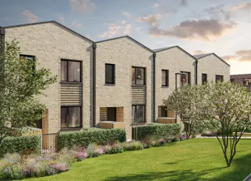 A row of light-brick Skylark family homes fronting onto a landscaped living street at Brabazon.