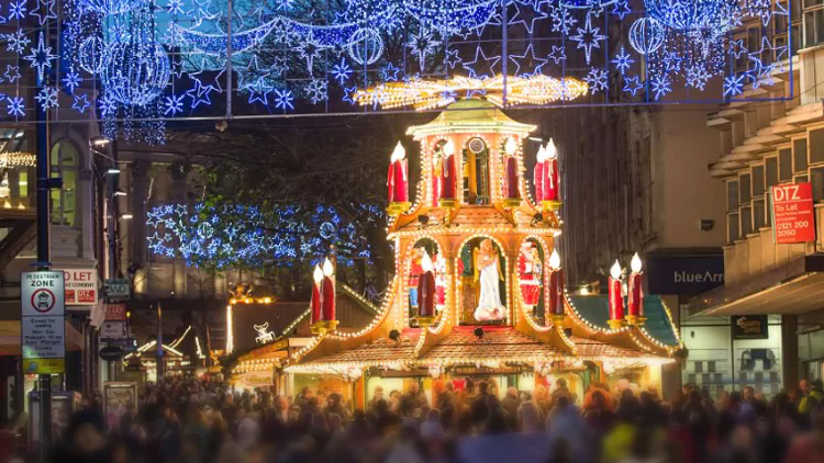 Birmingham sky lit up by Christmas lights.