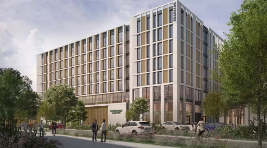 CGI of modern multi-story building at Brabazon surrounded by greenery and pedestrians, featuring new flagship Waitrose store on the ground floor.