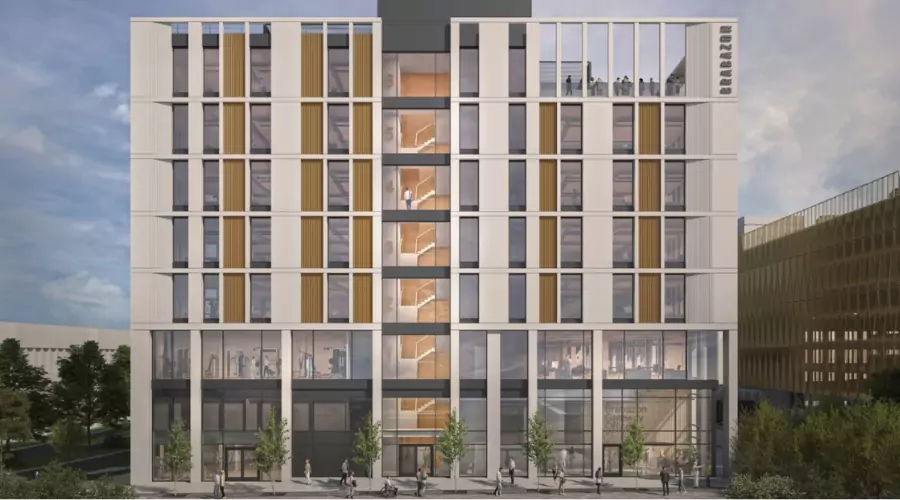 CGI of modern multi-story office building at Brabazon with glass façade, orange accents.