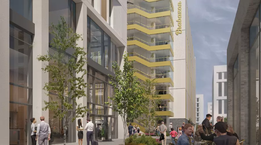 CGI of modern urban setting outside Waitrose office building at Brabazon.with a vibrant building featuring yellow balconies, greenery, and people engaged in conversation and activities.
